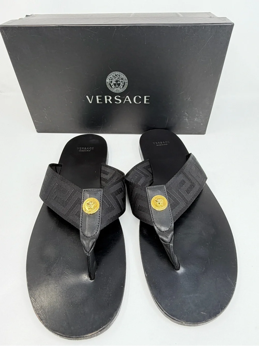 Versace Black Thong Sandals with Gold Medusa Accent